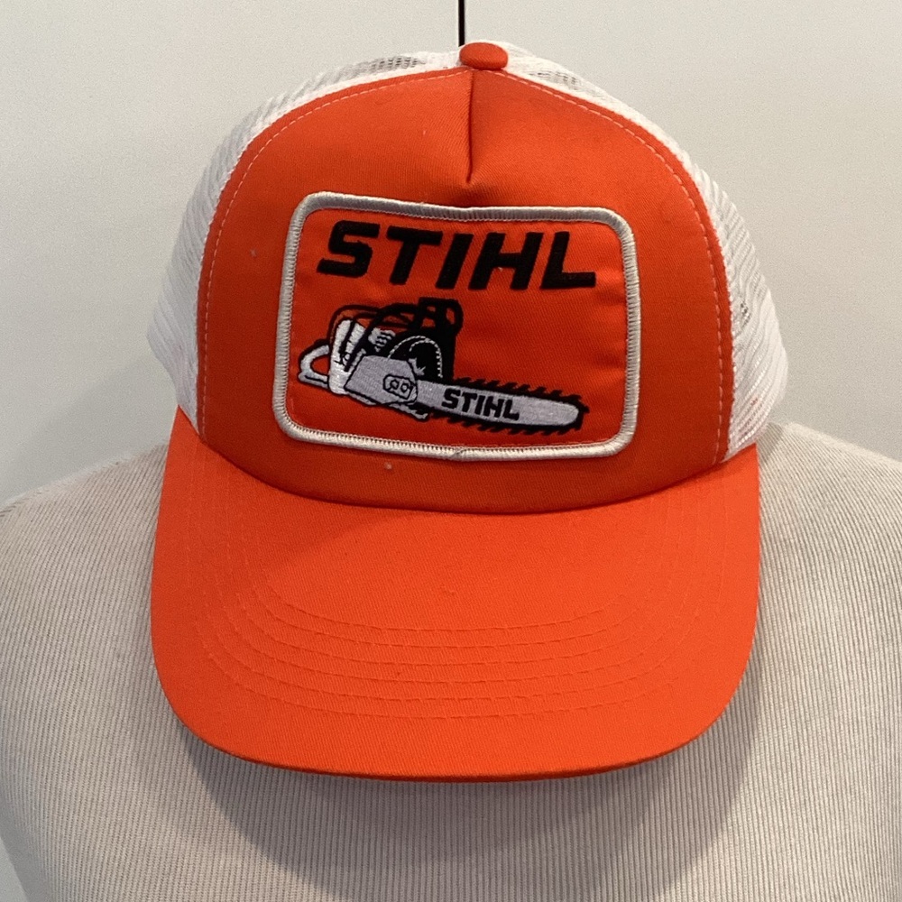Stihl orange and white trucker hat with Snap Closure